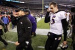 FOXBORO, MA - JANUARY 22:  Joe Flacco #5 of the Baltimore Ravens and head coach John Harbaugh walk off the field after losing to the New England Patriots in the AFC Championship Game at Gillette Stadium on January 22, 2012 in Foxboro, Massachusetts. The New England Patriots defeated the Baltimore Ravens 20-23.  (Photo by Rob Carr/Getty Images)