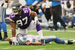 MINNEAPOLIS, MN - SEPTEMBER 25:   Everson Griffen #97 of the Minnesota Vikings looks at a referee after making a sack on  Matthew Stafford #9 of the Detroit Lions at the Hubert H. Humphrey Metrodome on September 25, 2011 in Minneapolis, Minnesota.  (Photo by Adam Bettcher /Getty Images)