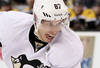 BOSTON, MA - APRIL 03:  Sidney Crosby #87 of the Pittsburgh Penguins takes the puck in the second period against the Boston Bruins on April 3, 2012 at TD Garden in Boston, Massachusetts.  (Photo by Elsa/Getty Images)