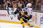 BOSTON, MA - JUNE 08:  Brad Marchand #63 of the Boston Bruins dodges Daniel Sedin #22 of the Vancouver Canucks during Game Four of the 2011 NHL Stanley Cup Final at TD Garden on June 8, 2011 in Boston, Massachusetts.  (Photo by Harry How/Getty Images)