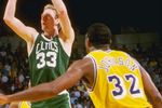 19 Feb 1988:  Guard Larry Bird of the Boston Celtics shoots the ball as Magic Johnson of the Los Angeles Lakers shoots the ball during a game at the Great Western Forum in Inglewood, California.   Mandatory Credit: Rick Stewart  /Allsport