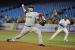 TORONTO, CANADA - APRIL 10:  Daniel Bard #51 of the Boston Red Sox delivers a pitch during MLB game action against the Toronto Blue Jays April 10, 2012 at Rogers Centre in Toronto, Ontario, Canada. (Photo by Brad White/Getty Images)