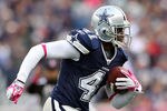 FOXBORO, MA - OCTOBER 16:  Terence Newman #41 of the Dallas Cowboys carries the ball after he intercepted a pass from Tom Brady of the New England Patriots on October 16, 2011 at Gillette Stadium in Foxboro, Massachusetts.  (Photo by Elsa/Getty Images)