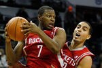CHARLOTTE, NC - JANUARY 10:  Teammates Kyle Lowry #7 and Kevin Martin #12 of the Houston Rockets against the Charlotte Bobcats during their game at Time Warner Cable Arena on January 10, 2012 in Charlotte, North Carolina.   NOTE TO USER: User expressly acknowledges and agrees that, by downloading and or using this photograph, User is consenting to the terms and conditions of the Getty Images License Agreement.  (Photo by Streeter Lecka/Getty Images)
