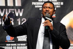LAS VEGAS, NV - NOVEMBER 11:  Former NBA basketball player and current ESPN broadcaster Jalen Rose hosts the official weigh-in for the bout between Manny Pacquiao and Juan Manuel Marquez at the MGM Grand Garden Arena November 11, 2011 in Las Vegas, Nevada. Pacquiao will defend his WBO welterweight title against Marquez when the two meet in the ring for the third time on November 12 in Las Vegas.  (Photo by Ethan Miller/Getty Images)