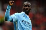 MANCHESTER, ENGLAND - OCTOBER 23:  Mario Balotelli of Manchester City celebrates scoring his team's second goal during the Barclays Premier League match between Manchester United and Manchester City at Old Trafford on October 23, 2011 in Manchester, England.  (Photo by Laurence Griffiths/Getty Images)