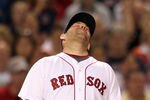 BOSTON, MA - SEPTEMBER 13:  Kevin Youkilis #20 of the Boston Red Sox reacts after a late throw to first on a ball hit by Brett Lawrie #13 of the Toronto Blue Jays in the third inning at Fenway Park September 13, 2011 in Boston, Massachusetts. (Photo by Jim Rogash/Getty Images)