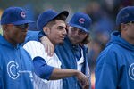 CHICAGO, IL - APRIL 12:   Relief pitcher James Russell #40 of the Chicago Cubs (R) hugs starting pitcher Matt Garza #22  after the game against the Milwaukee Brewers at Wrigley Field on April 12, 2012 in Chicago, Illinois. The The Cubs defeated the Brewers 8-0.   (Photo by Brian Kersey/Getty Images)