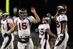 FOXBORO, MA - JANUARY 14:  (L-R) Tim Tebow #15 of the Denver Broncos celebrates a play with Demaryius Thomas #88 against the New England Patriots during their AFC Divisional Playoff Game at Gillette Stadium on January 14, 2012 in Foxboro, Massachusetts.  (Photo by Jim Rogash/Getty Images)