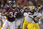 DENVER, CO - JANUARY 08:  Demaryius Thomas #88 of the Denver Broncos makes a pass reception and fights off Ike Taylor #24 of the Pittsburgh Steelers to go 80 yards for the game winning touchdown on the first play of overtime at Sports Authority Field at Mile High on January 8, 2012 in Denver, Colorado. The Broncos defeated the Steelers 29-23 in their AFC Wild Card Playoff game.  (Photo by Doug Pensinger/Getty Images)
