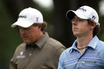 BETHESDA, MD - JUNE 17:  Rory McIlroy of Northern Ireland (R) walks off the eighth tee with Phil Mickelson during the second round of the 111th U.S. Open at Congressional Country Club on June 17, 2011 in Bethesda, Maryland.  (Photo by Ross Kinnaird/Getty Images)