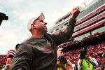 LINCOLN, NE - OCTOBER 30: Coach Bo Pelini of the Nebraska Cornhuskers pumps his fist to the Husker faithful after their game against the Missouri Tigers at Memorial Stadium on October 30, 2010 in Lincoln, Nebraska. Nebraska Defeated Missouri 31-17. (Photo by Eric Francis/Getty Images)
