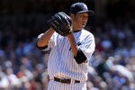 NEW YORK, NY - APRIL 13:  Hiroki Kuroda #18 of the New York Yankees pitches against the Los Angeles Angels during the home opener at Yankee Stadium on April 13, 2012 in the Bronx borough of New York City.  (Photo by Nick Laham/Getty Images)