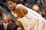 HARTFORD, CT - JANUARY 9:  Alex Oriakhi #34 of the Connecticut Huskies takes a look at the clock in the final minutes of a win against the West Virginia Mountaineers in the second  half at the XL Center on January 9, 2012,  in Hartford, Connecticut.  (Photo by Jim Rogash/Getty Images)