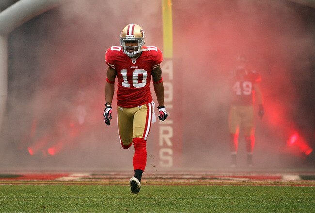 SAN FRANCISCO, CA - JANUARY 22:  Kyle Williams #10 of the San Francisco 49ers runs on the field during player introductions against the New York Giants during the NFC Championship Game at Candlestick Park on January 22, 2012 in San Francisco, California.  (Photo by Ezra Shaw/Getty Images)