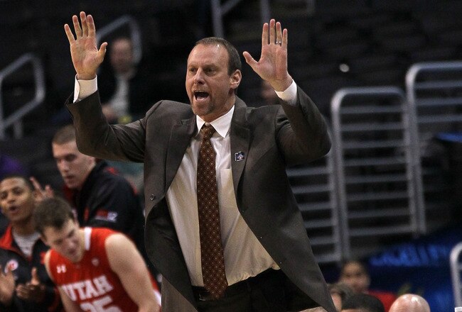 LOS ANGELES, CA - MARCH 07:  Head coach Larry Krystkowiak of the Utah Utes signals during the game with the Colorado Buffaloes during the first round of the Pac12 Men's Basketball Tournament at Staples Center on March 7, 2012 in Los Angeles, California.  (Photo by Stephen Dunn/Getty Images)