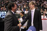 ST PAUL, MN - JUNE 25:  62nd overall pick Samu Perhonen by the Edmonton Oilers is greeted by General Manager Steve Tambellini of the Edmonton Oilers during day two of the 2011 NHL Entry Draft at Xcel Energy Center on June 25, 2011 in St Paul, Minnesota.  (Photo by Bruce Bennett/Getty Images)