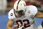 GLENDALE, AZ - JANUARY 02: Coby Fleener #82 of the Stanford Cardinal runs for yards after the catch against the Oklahoma State Cowboys during the Tostitos Fiesta Bowl on January 2, 2012 at University of Phoenix Stadium in Glendale, Arizona.  (Photo by Donald Miralle/Getty Images)