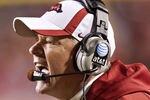 FAYETTEVILLE, AR - NOVEMBER 12:   Head Coach Bobby Petrino of the Arkansas Razorbacks yells to his players on the field during a game against the Tennessee Volunteers at Donald W. Reynolds Stadium Stadium on November 12, 2011 in Fayetteville, Arkansas.  The Razorbacks defeated the Volunteers 49 to 7.  (Photo by Wesley Hitt/Getty Images)