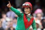 LOUISVILLE, KY - MAY 07:  Jockey John Velazquez, riding Animal Kingdom #16, celebrates winning the 137th Kentucky Derby at Churchill Downs on May 7, 2011 in Louisville, Kentucky.  (Photo by Matthew Stockman/Getty Images)