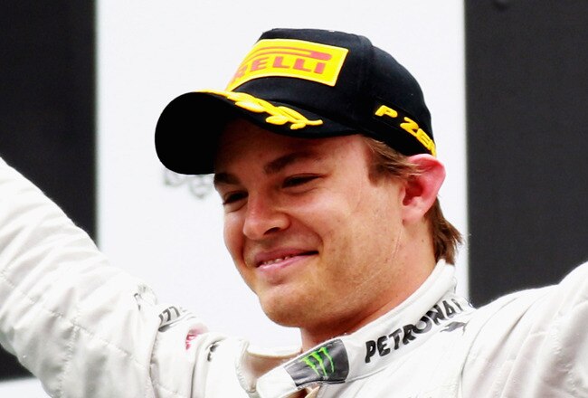 SHANGHAI, CHINA - APRIL 15:  Nico Rosberg of Germany and Mercedes GP celebrates on the podium after winning the Chinese Formula One Grand Prix at the Shanghai International Circuit on April 15, 2012 in Shanghai, China.  (Photo by Mark Thompson/Getty Images)