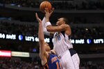 DALLAS, TX - MARCH 06:  Shawn Marion #0 of the Dallas Mavericks takes a shot against Steve Novak #16 of the New York Knicks at American Airlines Center on March 6, 2012 in Dallas, Texas.  NOTE TO USER: User expressly acknowledges and agrees that, by downloading and or using this photograph, User is consenting to the terms and conditions of the Getty Images License Agreement.  (Photo by Ronald Martinez/Getty Images)