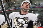 UNIONDALE, NY - MARCH 29: Craig Adams #27 of the Pittsburgh Penguins watches from the bench during the game against the New York Islanders at the Nassau Veterans Memorial Coliseum on March 29, 2012 in Uniondale, New York. The Islanders defeated the Penguins 5-3.  (Photo by Bruce Bennett/Getty Images)