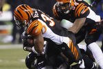 CINCINNATI, OH - JANUARY 01:  Cedric Benson #32 of the Cincinnati Bengals runs over Bernard Pollard #31 of the Baltimore Ravens during their game at Paul Brown Stadium on January 1, 2012 in Cincinnati, Ohio.  The Ravens defeated the Bengals 24-16.  (Photo by John Grieshop/Getty Images)