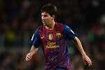 BARCELONA, SPAIN - APRIL 10:  Lionel Messi of FC Barcelona controls the ball during the La Liga match between FC Barcelona and Getafe CF at the Camp Nou stadium on April 10, 2012 in Barcelona, Spain.  (Photo by Jasper Juinen/Getty Images)