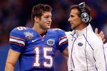 NEW ORLEANS - JANUARY 01:  Quarterback Tim Tebow #15  hugs head coach Urban Meyer of the Florida Gators after scoring a touchdown against the Cincinnati Bearcats during the Allstate Sugar Bowl at the Louisana Superdome on January 1, 2010 in New Orleans, Louisiana.  (Photo by Chris Graythen/Getty Images)