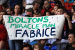 BOLTON, ENGLAND - MARCH 24:   Bolton fans show their support for Fabrice Muamba during the Barclays Premier League match between Bolton Wanderers and Blackburn Rovers at Reebok Stadium on March 24, 2012 in Bolton, England. Fabrice Muamba remains in intensive care at the London Chest Hospital after suffering a cardiac arrest during an FA Cup match between Tottenham Hotspur and Bolton Wanderers on Saturday March 17, 2012.  (Photo by Michael Steele/Getty Images)