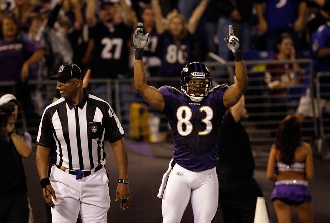 BALTIMORE, MD - AUGUST 25:  Wide receiver Lee Evans #83 of the Baltimore Ravens celebrates after scoring a touchdown against the Washington Redskins during the first half of a preseason game at M&T Bank Stadium on August 25, 2011 in Baltimore, Maryland.  (Photo by Rob Carr/Getty Images)