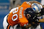 CHICAGO, IL - NOVEMBER 13: Julius Peppers #90 of the Chicago Bears sacks matthew Stafford #9 of  the Detroit Lions at Soldier Field on November 13, 2011 in Chicago, Illinois. (Photo by Scott Boehm/Getty Images)