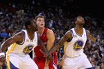 OAKLAND, CA - FEBRUARY 20:  Blake Griffin #32 of the Los Angeles Clippers and Ekpe Udoh #20 and Dorell Wright #1 of the Golden State Warriors go for a rebound at Oracle Arena on February 20, 2012 in Oakland, California.  NOTE TO USER: User expressly acknowledges and agrees that, by downloading and or using this photograph, User is consenting to the terms and conditions of the Getty Images License Agreement.  (Photo by Ezra Shaw/Getty Images)