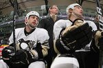 UNIONDALE, NY - MARCH 29: (L-R) Craig Adams #27 of the Pittsburgh Penguins, head coach Dan Bylsma and Jordan Staal #11 watch the action against the New York Islanders at the Nassau Veterans Memorial Coliseum on March 29, 2012 in Uniondale, New York. The Islanders defeated the Penguins 5-3. (Photo by Bruce Bennett/Getty Images)