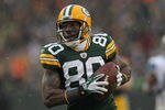 GREEN BAY, WI - JANUARY 01:  Donald Driver #80 of the Green Bay Packers reacts as he scores a touchdown against the Detroit Lions at Lambeau Field on January 1, 2012 in Green Bay, Wisconsin. The Packers defeated the Lions 45-41.  (Photo by Jonathan Daniel/Getty Images)