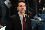 UNIONDALE, NY - FEBRUARY 11:  Assistant coach Scott Allen of the New York Islanders looks on prior to the game against the Los Angeles Kings on February 11, 2012 at Nassau Coliseum in Uniondale, New York. The Islanders defeated the Kings 2-1 in overtime.  (Photo by Jim McIsaac/Getty Images)