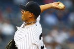 NEW YORK, NY - APRIL 16:  Freddy Garcia #36 of the New York Yankees pitches against the Minnesota Twins during their game on April 16, 2012 at Yankee Stadium in the Bronx borough of New York City.  (Photo by Al Bello/Getty Images)