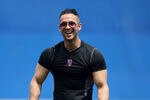 PORT ST. LUCIE, FL - MARCH 24:  Mike 'The Situation' Sorrentino of the reality show Jersey Shore, throws out the first pitch before the New York Mets take on the Houston Astros at Tradition Field on March 24, 2010 in Port St. Lucie, Florida.  (Photo by Doug Benc/Getty Images)