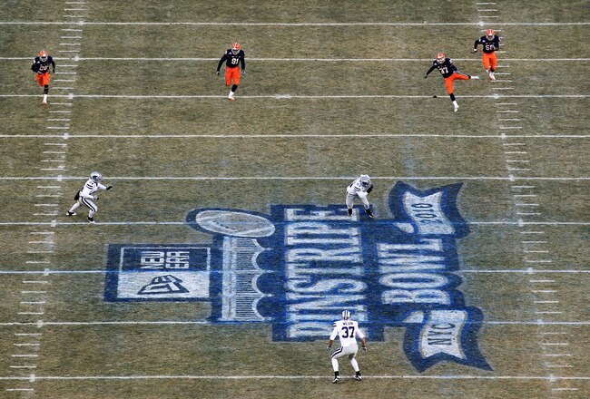 NEW YORK, NY - DECEMBER 30:  Ross Krautman #37 of the Syracuse Orange kicks off against the Kansas State Wildcats during the New Era Pinstripe Bowl at Yankee Stadium on December 30, 2010 in New York, New York.  (Photo by Chris McGrath/Getty Images)