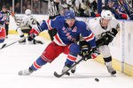 NEW YORK, NY - MARCH 15: Joe Vitale #46 of the Pittsburgh Penguins battles for possession with Brad Richards #19 of the New York Rangers at Madison Square Garden on March 15, 2012 in New York City.  (Photo by Nick Laham/Getty Images)