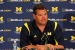 ANN ARBOR, MI - SEPTEMBER 03:  Head coach Brady Hoke of the Michigan Wolverines talks at a press conference after a weather shortened game between the Wolverines and the Western Michigan Broncos at Michigan Stadium on September 3, 2010 in Ann Arbor, Michigan. Michigan won the game 34-10. (Photo by Gregory Shamus/Getty Images)