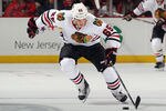 NEWARK, NJ - MARCH 27:  Andrew Shaw #65 of the Chicago Blackhawks skates against the New Jersey Devils at the Prudential Center on March 27, 2012 in Newark, New Jersey. The Devils defeated the Blackhwaks 2-1 in the shootout.  (Photo by Bruce Bennett/Getty Images)