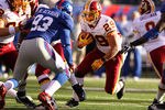 EAST RUTHERFORD, NJ - DECEMBER 18:   Roy Helu #29 of the Washington Redskins runs with the ball against the New York Giants during their game at MetLife Stadium on December 18, 2011 in East Rutherford, New Jersey.  (Photo by Al Bello/Getty Images)