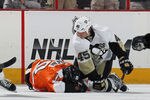 PHILADELPHIA, PA - APRIL 15: Arron Asham #45 of the Pittsburgh Penguins punches Brayden Schenn #10 of the Philadelphia Flyers in Game Three of the Eastern Conference Quarterfinals during the 2012 NHL Stanley Cup Playoffs at Wells Fargo Center on April 15, 2012 in Philadelphia, Pennsylvania. The Flyers defeated the Penguins 8-4.  (Photo by Bruce Bennett/Getty Images)
