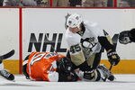 PHILADELPHIA, PA - APRIL 15: Arron Asham #45 of the Pittsburgh Penguins punches Brayden Schenn #10 of the Philadelphia Flyers in Game Three of the Eastern Conference Quarterfinals during the 2012 NHL Stanley Cup Playoffs at Wells Fargo Center on April 15, 2012 in Philadelphia, Pennsylvania. The Flyers defeated the Penguins 8-4.  (Photo by Bruce Bennett/Getty Images)