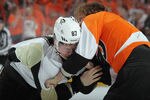 PHILADELPHIA, PA - APRIL 15: Sidney Crosby #87 of the Pittsburgh Penguins fights with Claude Giroux #28 of the Philadelphia Flyers in Game Three of the Eastern Conference Quarterfinals during the 2012 NHL Stanley Cup Playoffs at Wells Fargo Center on April 15, 2012 in Philadelphia, Pennsylvania. The Flyers defeated the Penguins 8-4.  (Photo by Bruce Bennett/Getty Images)