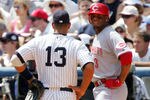 NEW YORK - JUNE 21:  Ken Griffey Jr. #3 of the Cincinnati Reds talks with Alex Rodriguez #13 of the New York Yankees on June 21, 2008 at Yankee Stadium in the Bronx borough of New York City.  (Photo by Jim McIsaac/Getty Images)