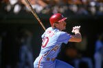 SAN DIEGO - 1987:  Mike Schmidt #20 of the Philadelphia Phillies watches the flight of the ball after a hit during a 1987 season game against the Padres at Jack Murphy Stadium in San Diego, California. (Photo by Stephen Dunn/Getty Images)