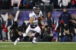 FOXBORO, MA - JANUARY 14:  Tim Tebow #15 of the Denver Broncos runs the ball against the New England Patriots during their AFC Divisional Playoff Game at Gillette Stadium on January 14, 2012 in Foxboro, Massachusetts.  (Photo by Al Bello/Getty Images)